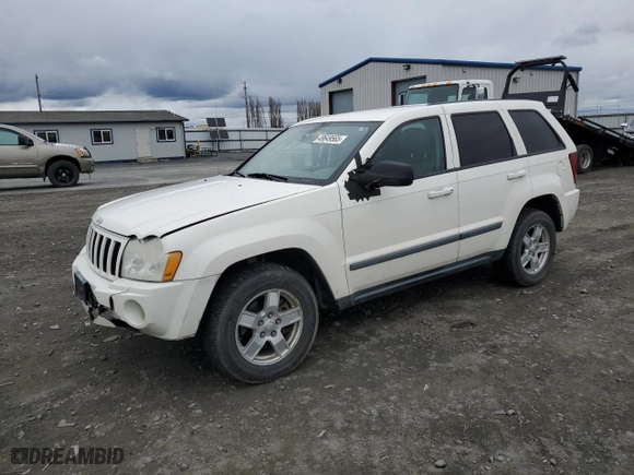 2007 Jeep Grand Cherokee Laredo with VIN 1J8GR48K17C638499, listed as a Copart auction lot 49649565 with 195,000 mi miles and Salvage Title. Bid and sale history available at carsss.com. Image 1.