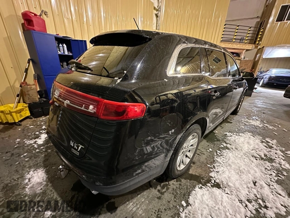 2017 Lincoln MKT with VIN 2LMHJ5NK3HBL01668, listed as a Copart auction lot 54481825 with 199,288 mi miles and Clean Title. Bid and sale history available at DreamBid. Image 4.