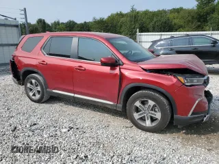 2024 Honda Pilot EX-L 7 Passenger with VIN 5FNYG2H55RB014873, listed as a Copart auction lot 69863864 with 2,935 mi miles and Salvage Title. Bid and sale history available at carsss.com. Image 4.