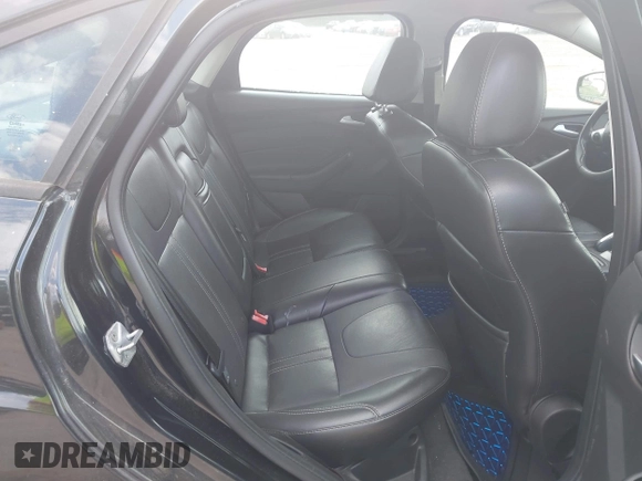 2013 Ford Focus SE z VIN 1FADP3F2XDL354156, wystawiony jako IAAI lot #42231744 z przebiegiem 123 518 mil mil oraz . Historia ofert i sprzedaży dostępna na DreamBid. Obrazek 8.