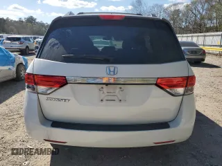 2016 Honda Odyssey EX-L with VIN 5FNRL5H69GB003379, listed as a Copart auction lot 48932295 with 144,904 mi miles and Salvage Title. Bid and sale history available at DreamBid. Image 6.