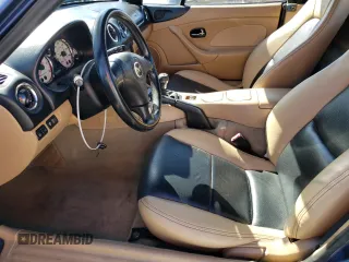 2002 Mazda MX-5 Miata Cloth z VIN JM1NB353820222664, wystawiony jako Copart lot #49701925 z przebiegiem 95 873 mil mil oraz Szkoda całkowita • Salvage title. Historia ofert i sprzedaży dostępna na DreamBid. Obrazek 7.