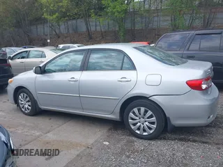2013 Toyota Corolla L with VIN 2T1BU4EEXDC052854, listed as a IAAI auction lot 42230118 with 156,120 mi miles and . Bid and sale history available at DreamBid. Image 14.