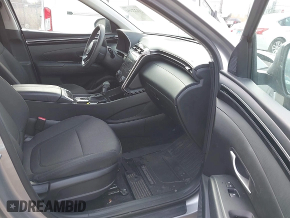 2022 Hyundai Tucson SEL z VIN 5NMJBCAE3NH070531, wystawiony jako IAAI lot #41222494 z przebiegiem 91 358 mil mil oraz . Historia ofert i sprzedaży dostępna na DreamBid. Obrazek 5.