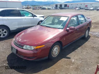2002 Saturn LS z VIN 1G8JS54F32Y553105, wystawiony jako IAAI lot #42237383 z przebiegiem 107 385 mil mil oraz . Historia ofert i sprzedaży dostępna na DreamBid. Obrazek 2.