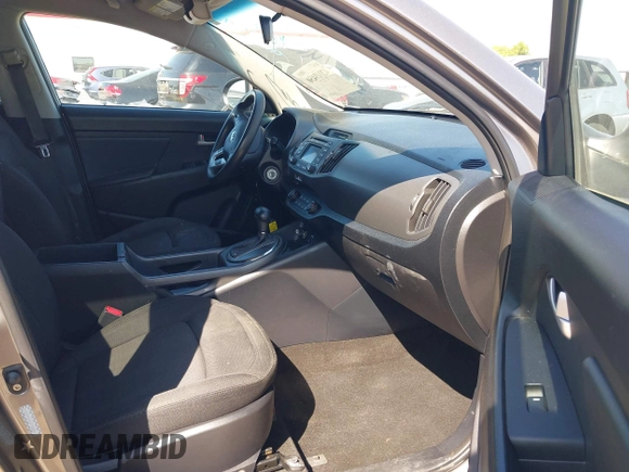 2013 Kia Sportage LX with VIN KNDPB3A21D7486860, listed as a IAAI auction lot 42049450 with 177,059 mi miles and . Bid and sale history available at DreamBid. Image 5.