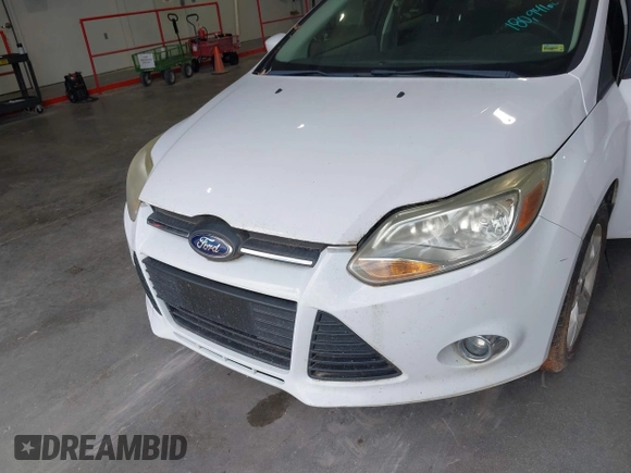 2012 Ford Focus SE with VIN 1FAHP3F23CL404590, listed as a IAAI auction lot 42671869 with 180,941 mi miles and . Bid and sale history available at DreamBid. Image 6.