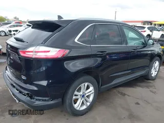 2020 Ford Edge SEL z VIN 2FMPK4J9XLBA78278, wystawiony jako IAAI lot #42181490 z przebiegiem 236 730 mil mil oraz . Historia ofert i sprzedaży dostępna na DreamBid. Obrazek 4.