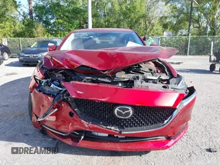 2018 Mazda 6 Grand Touring with VIN JM1GL1TY1J1302146, listed as a IAAI auction lot 41788881 with 55,852 mi miles and . Bid and sale history available at DreamBid. Image 13.