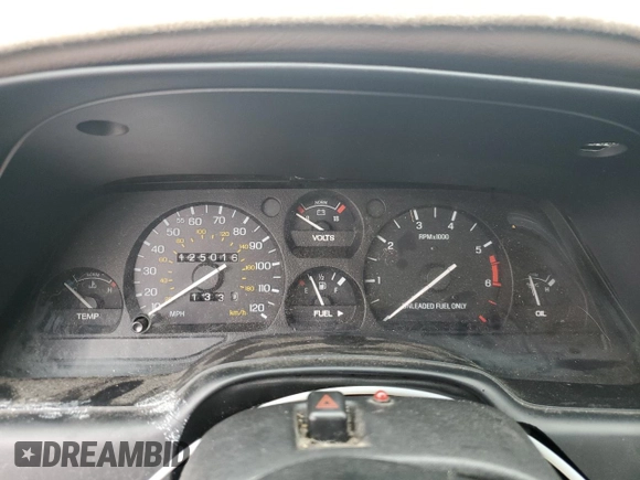 1994 Ford Thunderbird LX with VIN 1FALP6243RH223519, listed as a Copart auction lot 80962814 with 125,016 mi miles and Salvage Title. Bid and sale history available at DreamBid. Image 9.