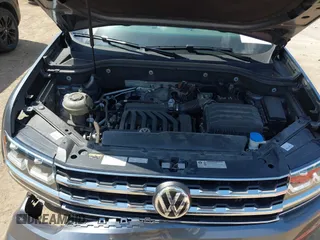 2019 Volkswagen Atlas SEL z VIN 1V2ER2CA5KC555568, wystawiony jako IAAI lot #42050516 z przebiegiem 71 599 mil mil oraz . Historia ofert i sprzedaży dostępna na DreamBid. Obrazek 10.