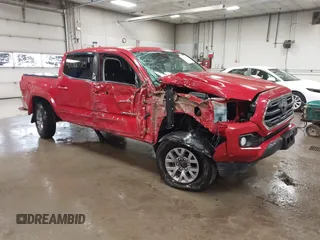 2019 Toyota Tacoma SR z VIN 3TMCZ5AN7KM232265, wystawiony jako IAAI lot #42060715 z przebiegiem 42 365 mil mil oraz . Historia ofert i sprzedaży dostępna na DreamBid. Obrazek 1.