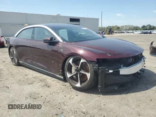 2023 Lucid Air Touring z VIN 50EA1TEA9PA004570, wystawiony jako Copart lot #51908985 z przebiegiem Nie podano mil oraz Szkody całkowita. Historia ofert i sprzedaży dostępna na DreamBid. Obrazek 4.