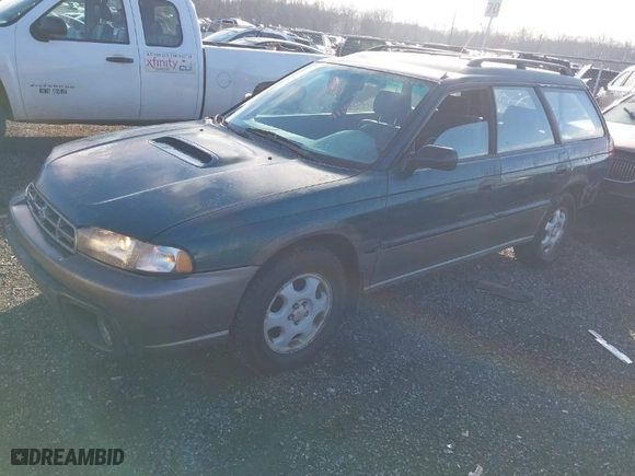 1997 Subaru Legacy Wagon Outback with VIN 4S3BG6858V7636266, listed as a IAAI auction lot 41198717 with 214,910 mi miles. Bid and sale history available at carsss.com. Image 2.