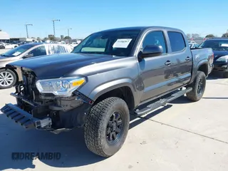 2023 Toyota Tacoma 4WD SR with VIN 3TYCZ5AN1PT146719, listed as a IAAI auction lot 41406963 with 19,735 mi miles. Bid and sale history available at carsss.com. Image 18.