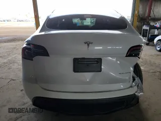 2024 Tesla Model Y Long Range with VIN 7SAYGDEE1RF165311, listed as a Copart auction lot 51711665 with 15,190 mi miles and Salvage Title. Bid and sale history available at DreamBid. Image 6.