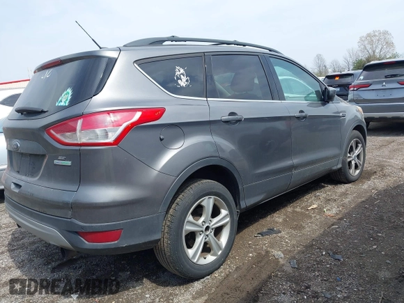 2013 Ford Escape SE with VIN 1FMCU0GX8DUB98700, listed as a IAAI auction lot 42012090 with 221,394 mi miles. Bid and sale history available at carsss.com. Image 4.