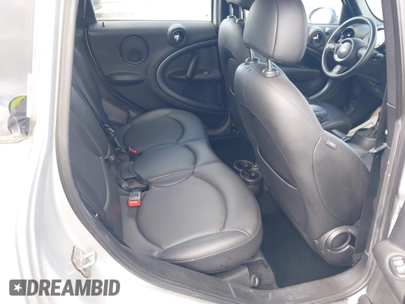 2014 MINI Countryman S with VIN WMWZC3C56EWP26003, listed as a IAAI auction lot 41884630 with 101,683 mi miles and . Bid and sale history available at DreamBid. Image 8.