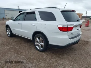 2013 Dodge Durango Citadel with VIN 1C4RDHEG2DC672632, listed as a IAAI auction lot 42432340 with 246,901 mi miles and . Bid and sale history available at DreamBid. Image 3.