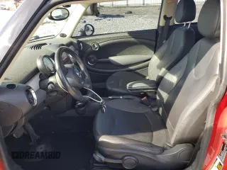 2012 MINI Hardtop with VIN WMWSU3C57CT261602, listed as a Copart auction lot 50017915 with 191,692 mi miles and Salvage Title. Bid and sale history available at DreamBid. Image 7.