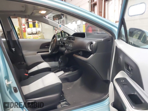 2014 Toyota Prius One z VIN JTDKDTB3XE1060360, wystawiony jako IAAI lot #41972531 z przebiegiem 140 012 mil mil oraz . Historia ofert i sprzedaży dostępna na DreamBid. Obrazek 5.