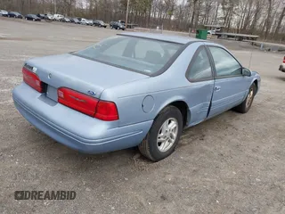 1997 Ford Thunderbird LX with VIN 1FALP62W2VH105702, listed as a IAAI auction lot 41713980 with 90,775 mi miles and . Bid and sale history available at DreamBid. Image 4.