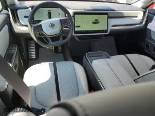 2024 Rivian R1S Adventure with VIN 7PDSGABA7RN040780, listed as a Copart auction lot 63705184 with 1,053 mi miles and Salvage Title. Bid and sale history available at carsss.com. Image 8.