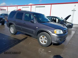 2006 Mazda Tribute LX with VIN 4F2YZ94166KM15756, listed as a IAAI auction lot 41448862 with 101,862 mi miles. Bid and sale history available at carsss.com. Image 1.