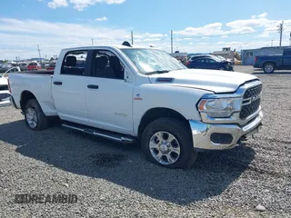 2024 Ram 2500 Big Horn with VIN 3C6UR5DL5RG303820, listed as a IAAI auction lot 42615583 with 14,564 mi miles and . Bid and sale history available at DreamBid. Image 1.