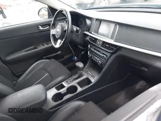 2019 Kia Optima LX with VIN 5XXGT4L37KG361486, listed as a IAAI auction lot 41601404 with 56,891 mi miles. Bid and sale history available at carsss.com. Image 5.