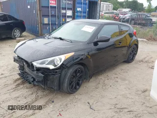 2013 Hyundai Veloster w/Black Int with VIN KMHTC6AD3DU084995, listed as a IAAI auction lot 42513920 with 103,595 mi miles and . Bid and sale history available at DreamBid. Image 2.