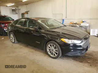 2017 Ford Fusion Hybrid SE z VIN 3FA6P0LU2HR247283, wystawiony jako Copart lot #62571495 z przebiegiem 167 042 mil mil oraz Nie do naprawy • Non repairable. Historia ofert i sprzedaży dostępna na DreamBid. Obrazek 4.