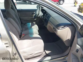 2001 Ford Taurus SES with VIN 1FAFP55U61A104864, listed as a IAAI auction lot 42004016 with 166,694 mi miles. Bid and sale history available at carsss.com. Image 5.