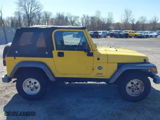 2004 Jeep Wrangler X with VIN 1J4FA39S84P800291, listed as a IAAI auction lot 41975648 with 205,402 mi miles. Bid and sale history available at carsss.com. Image 13.
