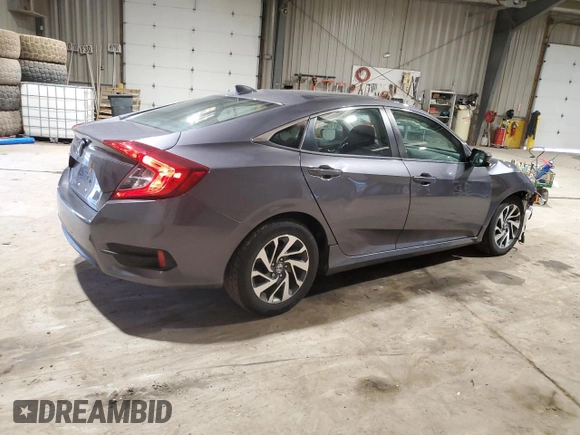 2018 Honda Civic EX with VIN 19XFC2F75JE005057, listed as a Copart auction lot 48601125 with 84,100 mi miles and Salvage Title. Bid and sale history available at DreamBid. Image 3.