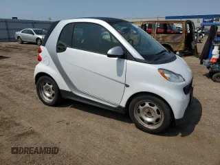 2014 Smart fortwo Pure z VIN WMEEJ3BA5EK779399, wystawiony jako Copart lot #59279785 z przebiegiem 117 204 mil mil oraz Tytuł czysty. Historia ofert i sprzedaży dostępna na DreamBid. Obrazek 4.