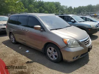 2008 Honda Odyssey Touring z VIN 5FNRL38968B025520, wystawiony jako Copart lot #60799645 z przebiegiem 116 592 mil mil oraz Szkoda całkowita • Salvage title. Historia ofert i sprzedaży dostępna na DreamBid. Obrazek 4.
