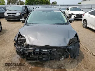 2014 Ford Focus SE z VIN 1FADP3K29EL187201, wystawiony jako Copart lot #59125805 z przebiegiem Nie podano mil oraz Szkoda całkowita • Salvage title. Historia ofert i sprzedaży dostępna na DreamBid. Obrazek 5.