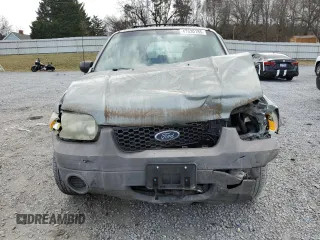 2005 Ford Escape XLS Value z VIN 1FMYU92Z05KA21168, wystawiony jako Copart lot #47630185 z przebiegiem 253 389 mil mil oraz Szkoda całkowita • Salvage title. Historia ofert i sprzedaży dostępna na DreamBid. Obrazek 5.
