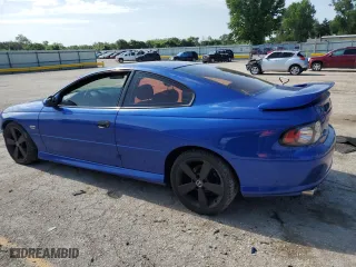 2004 Pontiac GTO with VIN 6G2VX12GX4L287389, listed as a Copart auction lot 57881874 with 107,291 mi miles and Salvage Title. Bid and sale history available at carsss.com. Image 2.