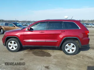 2013 Jeep Grand Cherokee Laredo with VIN 1C4RJEAG9DC538259, listed as a IAAI auction lot 41832676 with 143,000 mi miles. Bid and sale history available at carsss.com. Image 14.