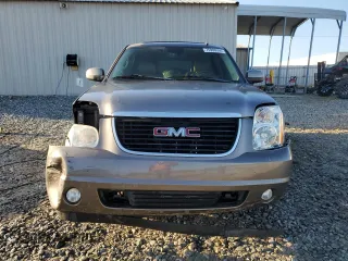 2011 GMC Yukon SLT with VIN 1GKS1CE05BR270876, listed as a Copart auction lot 75906934 with 215,964 mi miles and Salvage Title. Bid and sale history available at carsss.com. Image 5.