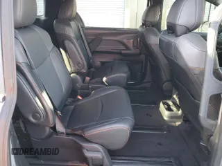 2023 Toyota Sienna XSE with VIN 5TDDSKFC9PS104275, listed as a Copart auction lot 43190195 with 19,644 mi miles and Salvage title. Bid and sale history available at DreamBid. Image 11.
