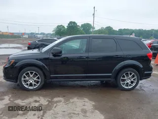 2015 Dodge Journey R/T with VIN 3C4PDDEG1FT554904, listed as a IAAI auction lot 42415888 with 143,039 mi miles and . Bid and sale history available at DreamBid. Image 14.