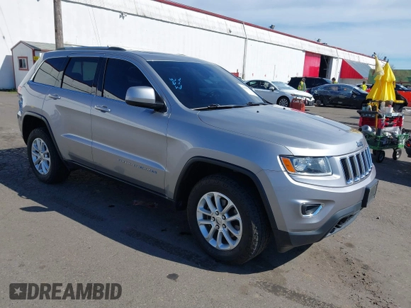 2016 Jeep Grand Cherokee Laredo z VIN 1C4RJFAG7GC392261, wystawiony jako IAAI lot #41890922 z przebiegiem 107 546 mil mil oraz . Historia ofert i sprzedaży dostępna na DreamBid. Obrazek 1.