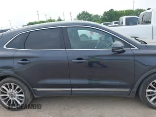 2015 Lincoln MKC with VIN 5LMCJ1A94FUJ13716, listed as a IAAI auction lot 41911220 with 194,825 mi miles. Bid and sale history available at carsss.com. Image 13.
