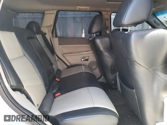 2005 Jeep Grand Cherokee Limited with VIN 1J8HR58235C704767, listed as a Copart auction lot 54436665 with 114,430 mi miles and Salvage title. Bid and sale history available at DreamBid. Image 11.