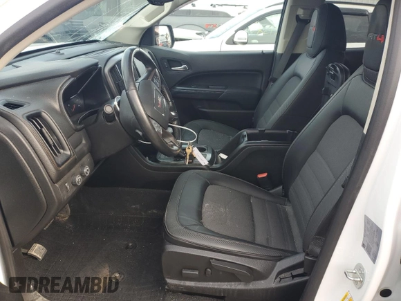 2021 GMC Canyon 4WD AT4 w/Leather with VIN 1GTG6FEN0M1100300, listed as a Copart auction lot 82281314 with 60,086 mi miles and Non Repairable. Bid and sale history available at carsss.com. Image 7.
