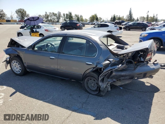 1999 Nissan Maxima GXE z VIN JN1CA21D9XM409448, wystawiony jako Copart lot #51822895 z przebiegiem Nie podano mil oraz Szkoda całkowita • Salvage title. Historia ofert i sprzedaży dostępna na DreamBid. Obrazek 2.
