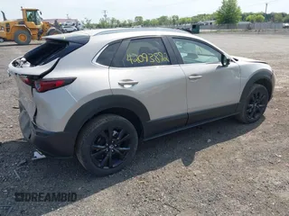 2024 Mazda CX-30 2.5 S Select Sport with VIN 3MVDMBBM0RM698412, listed as a IAAI auction lot 42093892 with 24,454 mi miles. Bid and sale history available at carsss.com. Image 4.